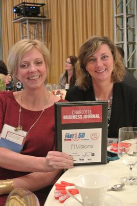 Lore (VP of Operations) and Donna (Director of Sales) with our new award