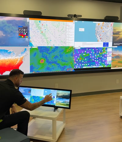 User interacting with ThinkHub on a small display panel for fire prevention tracking