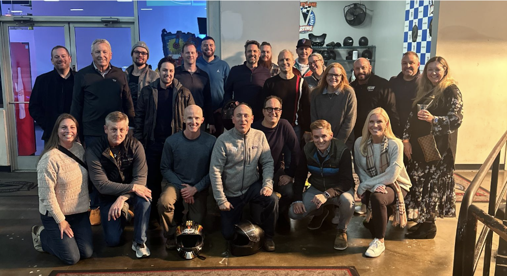 The T1V team poses at Victory Lanes racing team outing